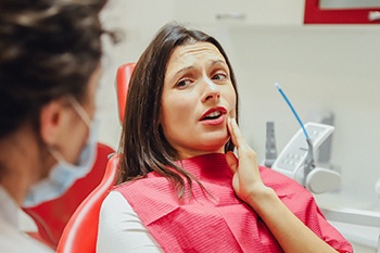 Woman seeing emergency dentist in Columbia