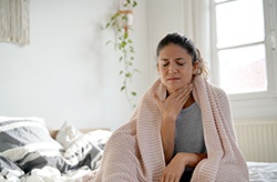 Woman with a sore throat