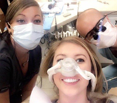 Dentists with patient